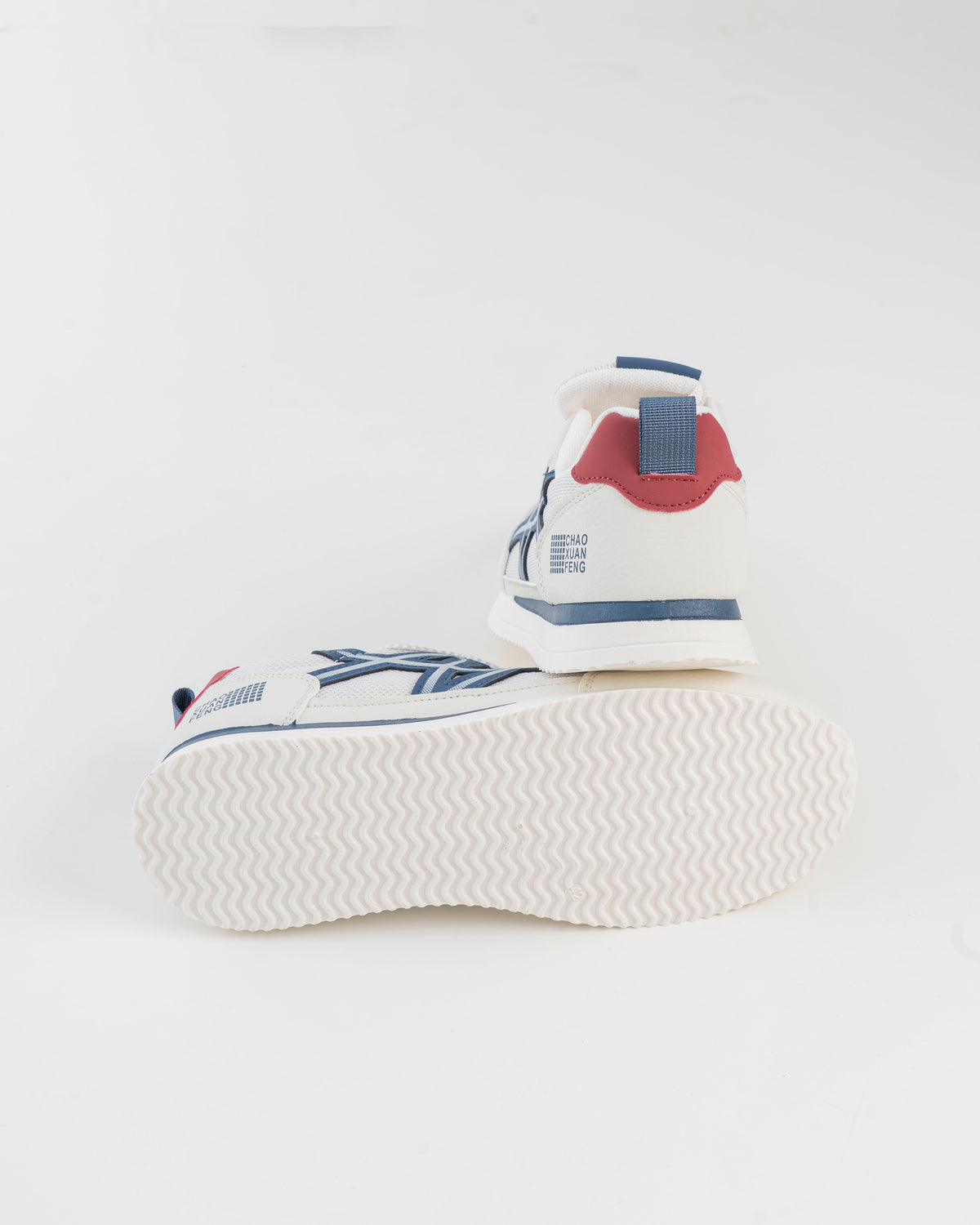 Men's white sneaker side and heel view