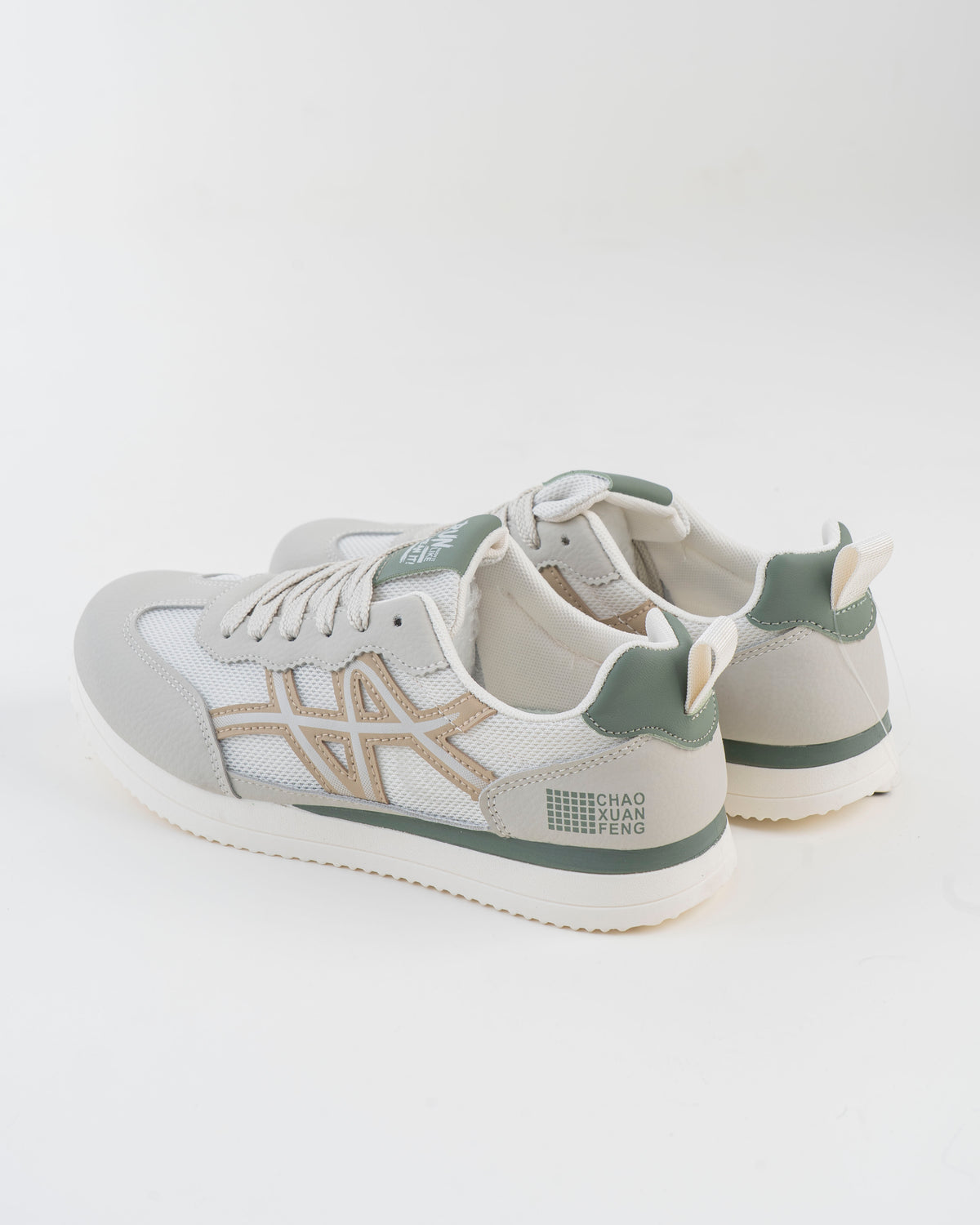 Men's white and grey sneaker outsole detail