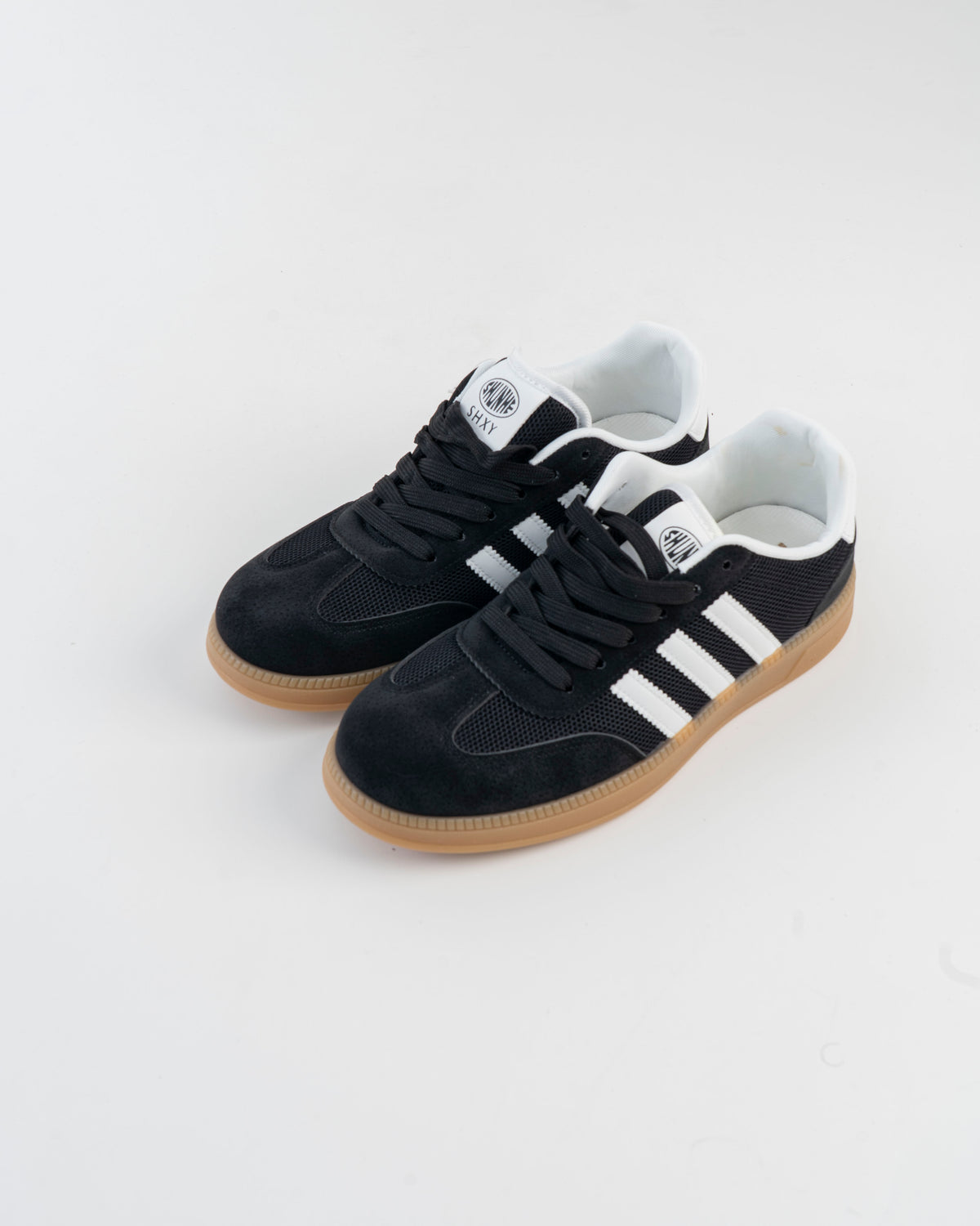 Men's black sneaker with textured gum outsole