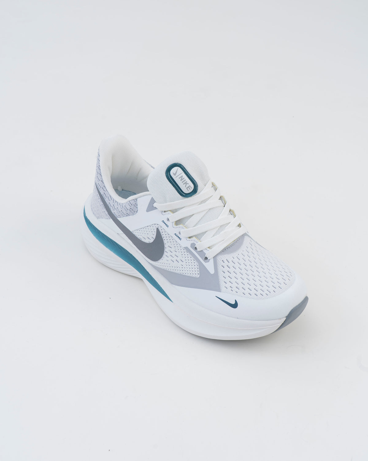 White and grey men's mesh sneaker with teal accent, close-up