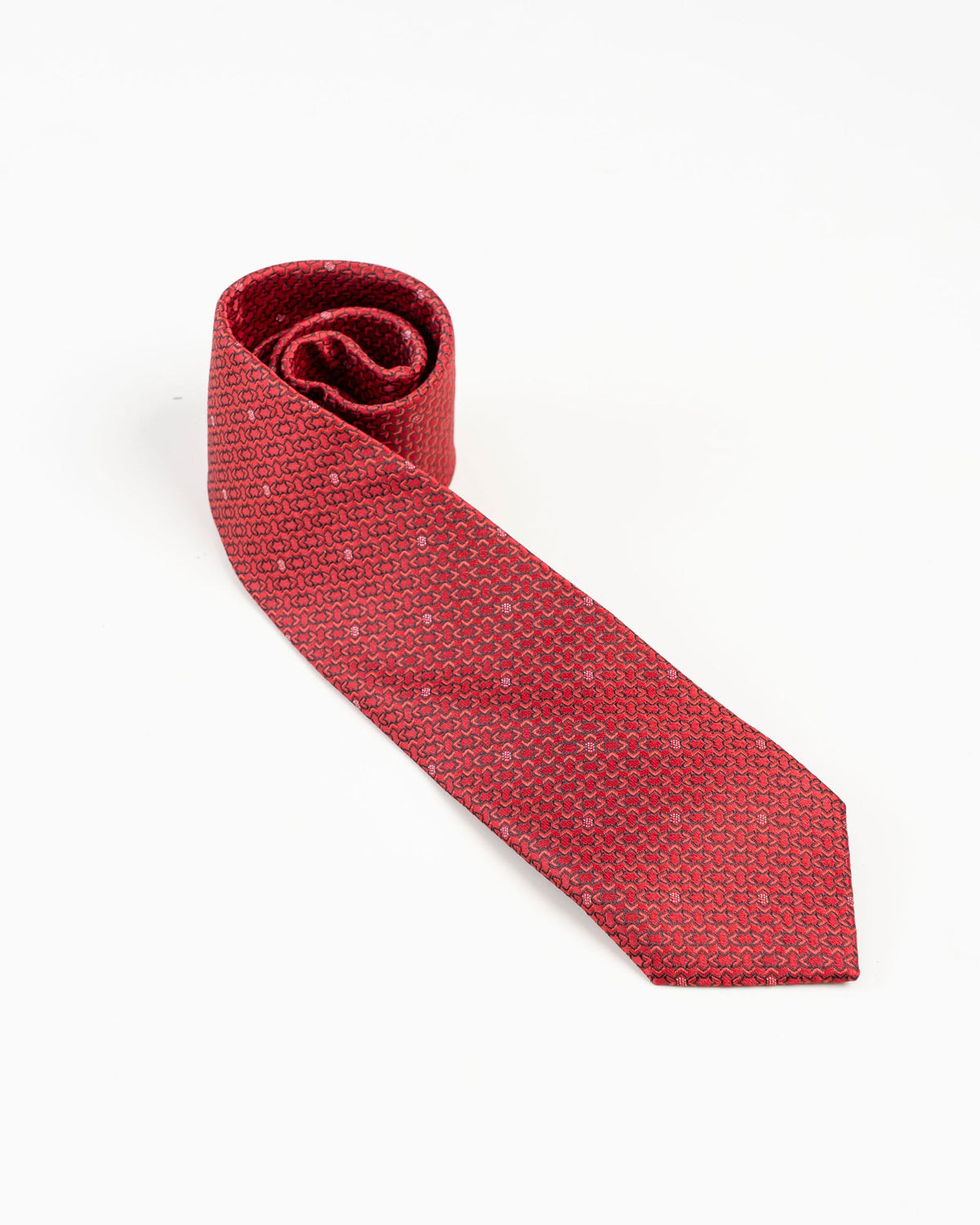 Full view of red textured patterned necktie