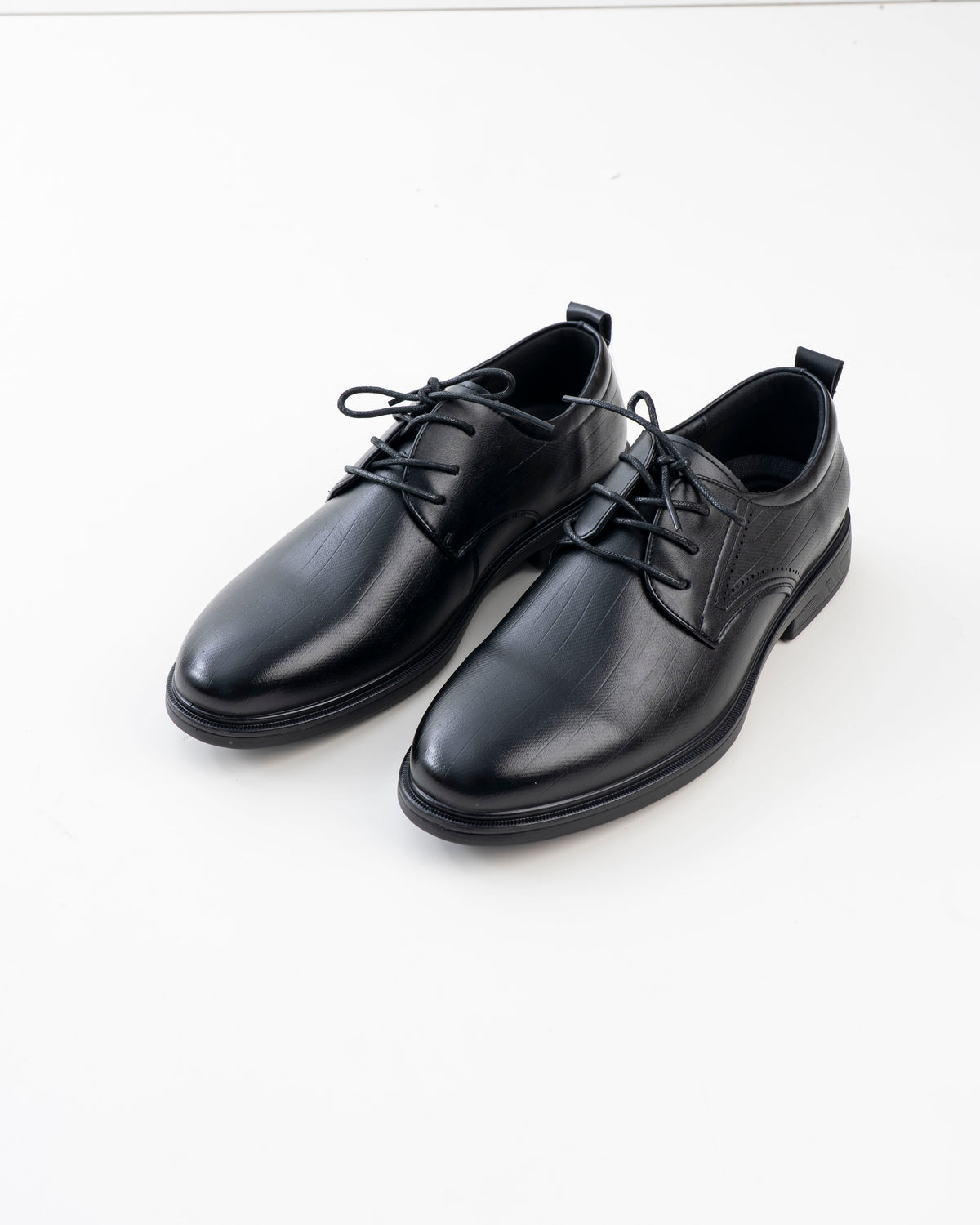 Pair of men's black lace-up formal shoes