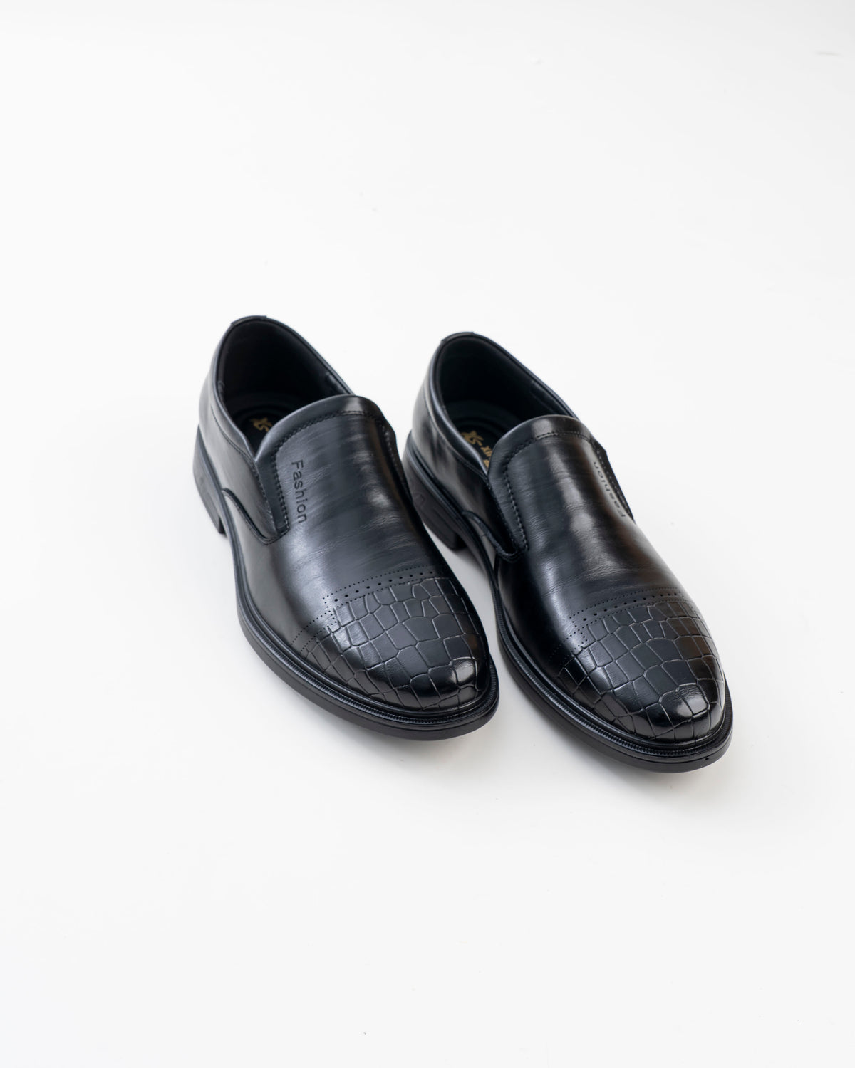 Pair of men's black croc-pattern slip-on formal shoes