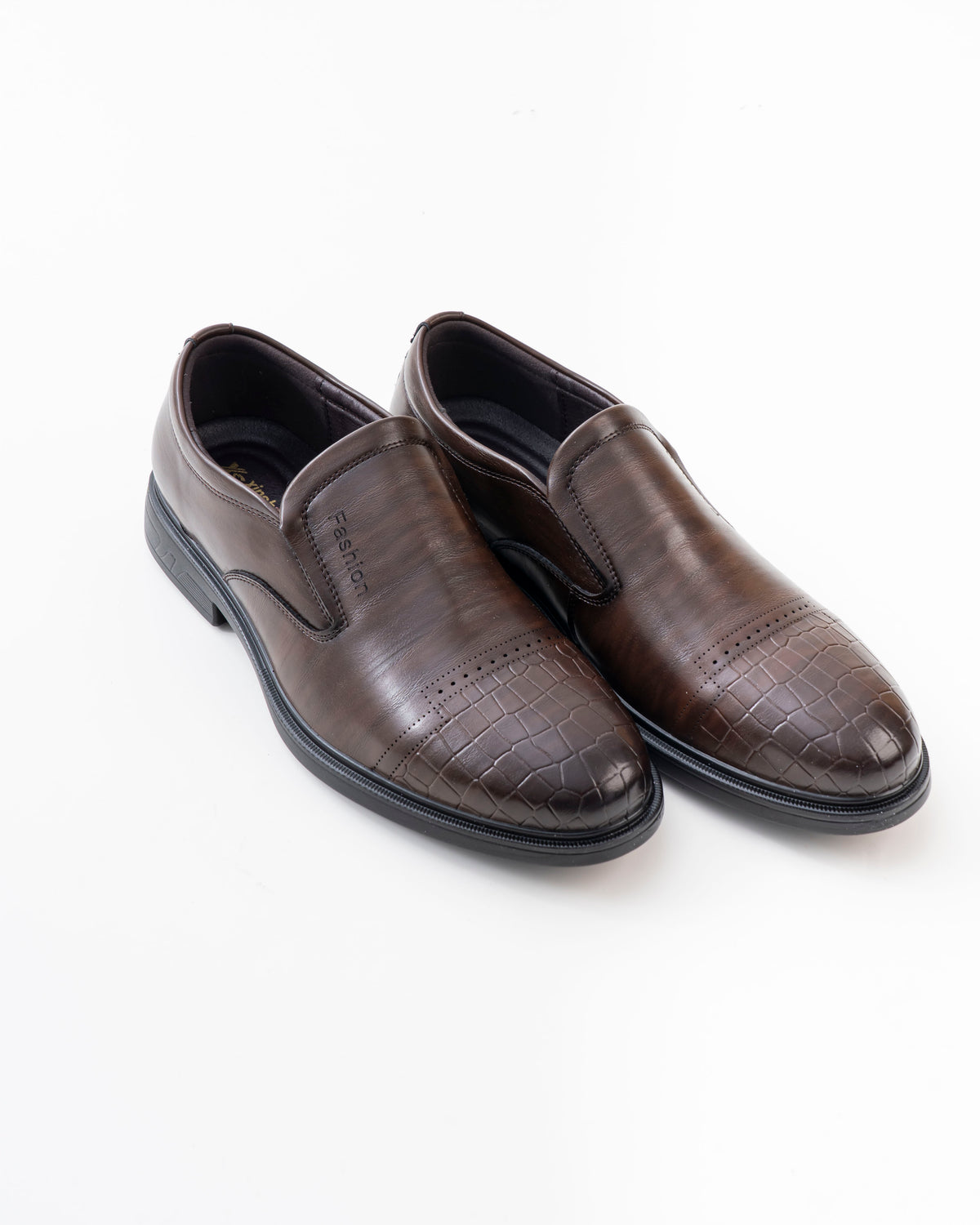 Pair of men's brown croc-pattern slip-on formal shoes